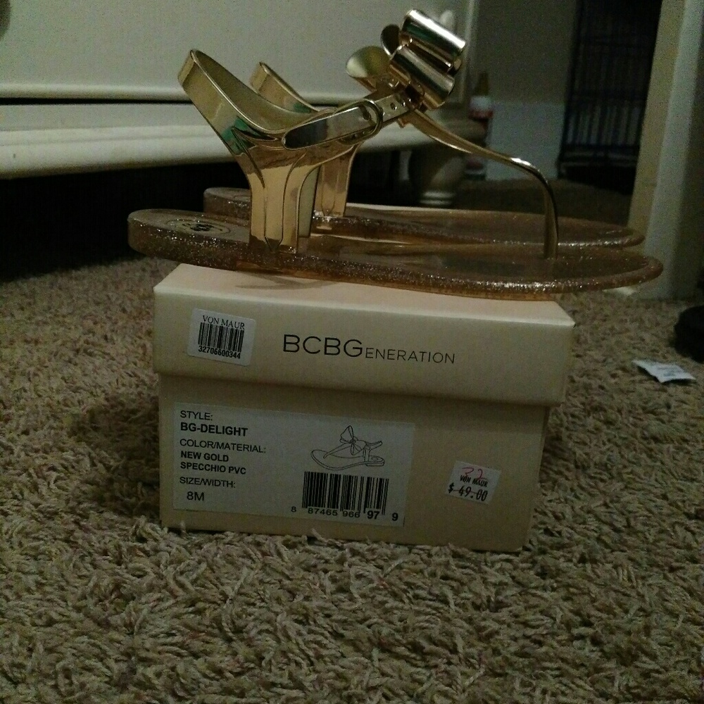 Women's gold bow sandals